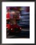 Bus In Picadilly Circus, London, United Kingdom by Chris Mellor Limited Edition Print