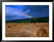 Straw Bales And Rainbow At Harvest Time, Ireland by Gareth Mccormack Limited Edition Print