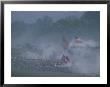 Flags, Soldiers, And Gun Smoke During A Civil War Reenactment by Kenneth Garrett Limited Edition Print