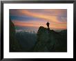 A Silhouetted Climber Watches The Sun Set Over The Karakoram Mountains by Bobby Model Limited Edition Print