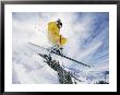 A Skier In A Yellow Suit Goes Airborne by Paul Chesley Limited Edition Print
