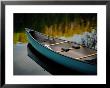 Canoe And Reflections On A Still Lake by Raymond Gehman Limited Edition Print
