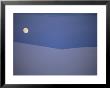 The Moon Rises Over A Sand Dune In White Sands National Monument by Raul Touzon Limited Edition Print