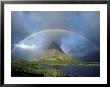 Rainbow Hangs Over Grinnel Point, Glacier National Park, Montana, Usa by Janis Miglavs Limited Edition Print
