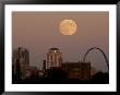 A Full Moon Rises Behind Downtown Saint Louis Buildings And The Gateway Arch, October 2006 by Charlie Riedel Limited Edition Print