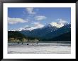 Hockey On Frozen Green Lake In Whistler, British Columbia, Canada by Taylor S. Kennedy Limited Edition Print