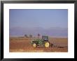 Farmer In Tractor, San Luis Valley, Co by Gary Conner Limited Edition Print