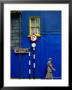 Woman Walking Past Building, Wexford, Ireland by Martin Moos Limited Edition Print