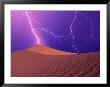 Lightning Bolts Striking Sand Dunes, Death Valley National Park, California, Usa by Steve Satushek Limited Edition Print