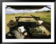 Wildlife Seekers In A Jeep On A Game Drive by Michael Melford Limited Edition Pricing Art Print