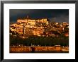 Dark Clouds At Sunset Hang Over The Velha Universidade (Old University) Of Coimbra, Portugal by Anders Blomqvist Limited Edition Print