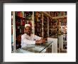 Perfume Shop Owner In Old Souq, Kuwait by Mark Daffey Limited Edition Print