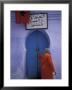 Woman Exits Thru Moorish-Style Blue Door, Morocco by John & Lisa Merrill Limited Edition Pricing Art Print