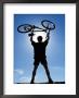 Silhouette Of Cyclist Holding Bike Over His Head by Charlie Borland Limited Edition Print