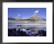 Fishermen In Canoe On Waterfowl Lake, Banff National Park, Canada by Janis Miglavs Limited Edition Print