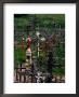 Crucifixes Surrounding Statue On Hill Of Crosses, Siauliai, Lithuania by Pershouse Craig Limited Edition Print