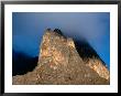 Clouds Partially Mask Point John An Outlying Peak Of Mount Kenya, Mt. Kenya National Park, Kenya by Grant Dixon Limited Edition Print