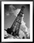 Creditul Minier Oil Well Watched Over By Armed Guards 17 Kilometers From Ploesti In A Oil Field by Margaret Bourke-White Limited Edition Print