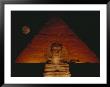 A View Of The Great Sphinx And The Chephren Pyramid At Night by Bill Ellzey Limited Edition Print