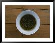 Tea Leaves Steep In A Cup Of Hot Water For Green Tea by Jodi Cobb Limited Edition Print