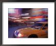 Blurred View Of Taxi Cab In Times Square, Nyc by Rudi Von Briel Limited Edition Print