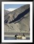 A Boatman Rows A Yak Skin Boat Across The Lhasa River by Gordon Wiltsie Limited Edition Print