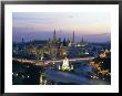 Wat Phra Kaew, The Temple Of The Emerald Buddha, And The Grand Palace At Dusk In Bangkok, Thailand by Gavin Hellier Limited Edition Print