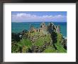Dunluce Castle On Rocky Coastline, County Antrim, Ulster, Northern Ireland, Uk, Europe by Gavin Hellier Limited Edition Print