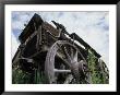 Old Horse-Drawn Wagon In Mining Ghost Town, Nevada City, Montana, Usa by John & Lisa Merrill Limited Edition Print