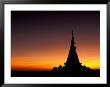 Sunset Sillouhette Of Buddhist Temple, Thailand by John & Lisa Merrill Limited Edition Print