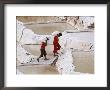 Men Carrying Bags Of Salt From Salt Pools, Salinas, Peru by Dennis Kirkland Limited Edition Print