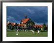 Playing Croquet In Front Of Former Bath House, Now Museum Of Art And History, Rotorua, New Zealand by Krzysztof Dydynski Limited Edition Print