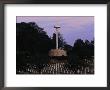 A Naval Monument And Graves Of Lost Soldiers In A National Cemetery by Ira Block Limited Edition Print