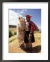 Portrait Of A Peruvian Girl In Traditional Dress, With An Animal, Near Cuzco, Peru, South America by Gavin Hellier Limited Edition Print