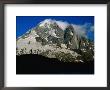 Walker Silhouetted Against Aiguille Verte On Tour Du Mont Blanc, Chamonix Valley, France by Gareth Mccormack Limited Edition Print