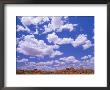 Natural Rock Formations With Clouds Above, Devil's Marbles Conservation Reserve, Australia by John Banagan Limited Edition Print