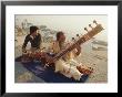 Musicians Playing The Sitar And Tabla On The Banks Of The River Ganges, Varanasi, India by John Henry Claude Wilson Limited Edition Print