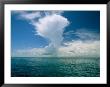 Dramatic Clouds Over Calm Blue Pacific Ocean Waters by Wolcott Henry Limited Edition Print