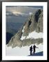 Skiers Contemplate A Storm Cloud Over The White Mountains In Nevada by Gordon Wiltsie Limited Edition Print