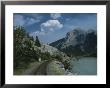 Train Tracks Winding Their Way Past A Lake In The Canadian Rockies by Todd Gipstein Limited Edition Print