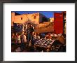 Boy Selling Ceramic Pottery From Roadside Stall, Tripoli, Libya by Patrick Syder Limited Edition Print