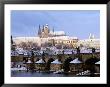 Snow Covered Prague Castle, Charles Bridge And Suburb Of Mala Strana by Richard Nebesky Limited Edition Print