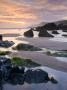 Rockpools And Sand At Combesgate Beach In North Devon, England by Adam Burton Limited Edition Print