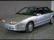 Spiffy New Silver Saturn Sl2 Sports Touring Sedan Manufactured By Gm In Spring Hill, Tn Plant by Ted Thai Limited Edition Pricing Art Print