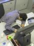Office Life And Interiors, Office Worker Slumped On Desk by Richard Bryant Limited Edition Print