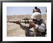 Iraqi Army Sergeant Sights In Down Range During An Advanced Marksmanship Course by Stocktrek Images Limited Edition Print