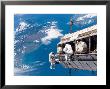 Sts-116 Mission Specialists Participate In The First Of The Three Mission's Extravehicular Activity by Stocktrek Images Limited Edition Print