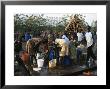 Women Collecting Water At The Dimma Refugee Camp, Ethiopia, Africa by D H Webster Limited Edition Print