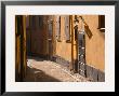 Cobblestone Street In Gamla Stan, Iron Cellar Door And Old Lamp, Stockholm, Sweden by Per Karlsson Limited Edition Print
