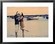 Kissing Couple At Playa De Las Teresitas, Tenerife, Canary Islands, Spain by Michele Westmorland Limited Edition Print